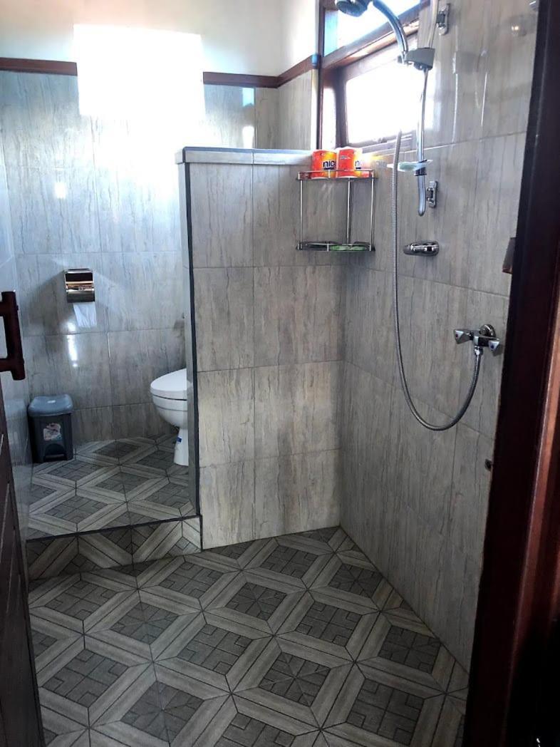Maliana Homestay Мундук Экстерьер фото